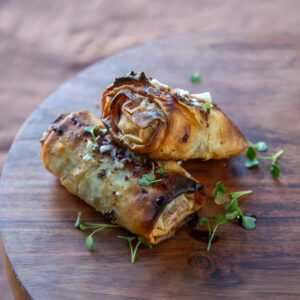 Roll de cordero, reducción de Malbec
